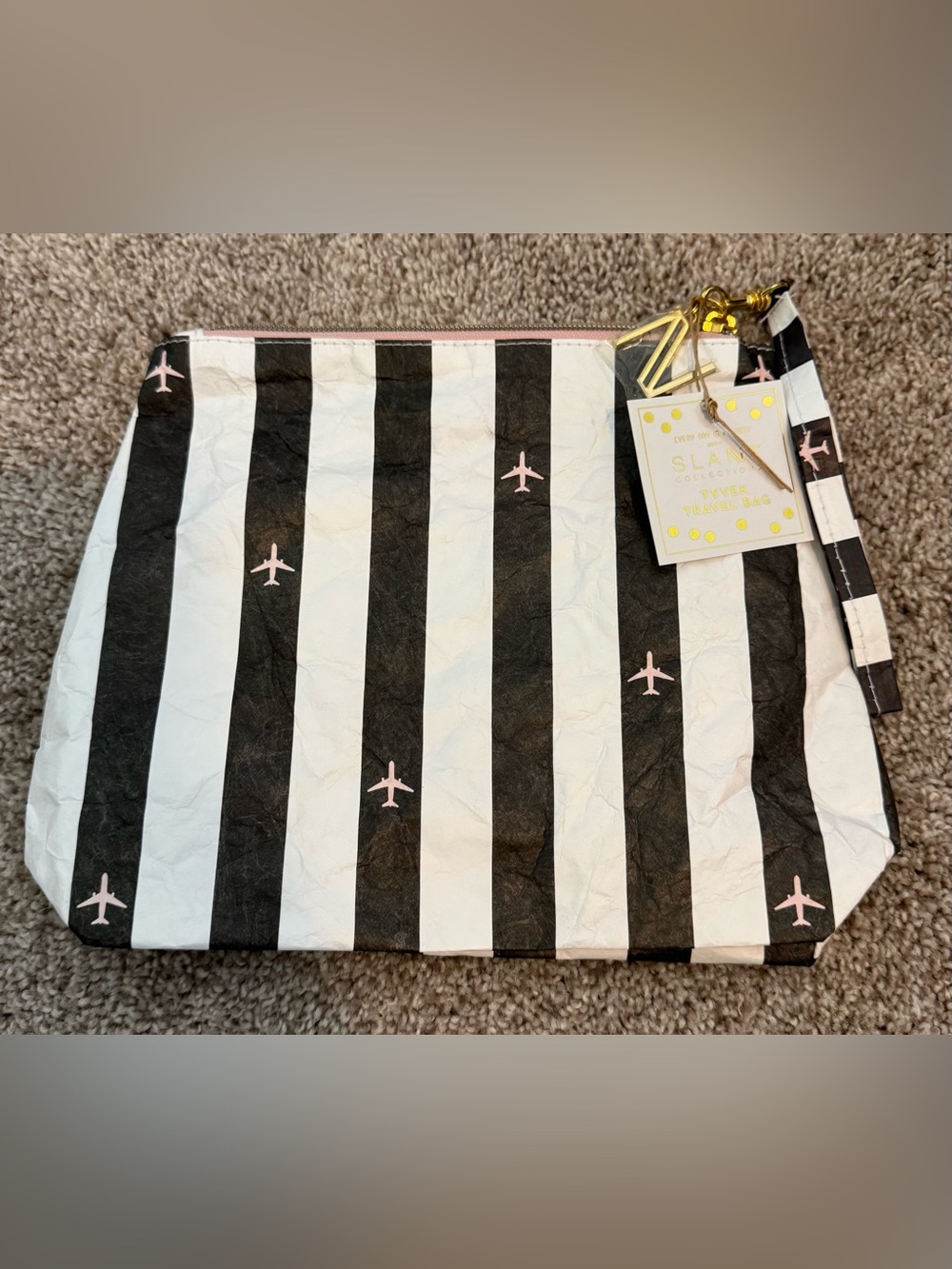 Striped Black & White Travel Pouch with Pink Plane Accents
